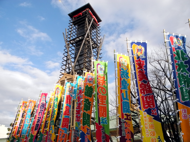 Multicoloured banners celebrate the wrestlers at Ryōgoku Kokugikan stadium, Tokyo, visiting a sumo tournament