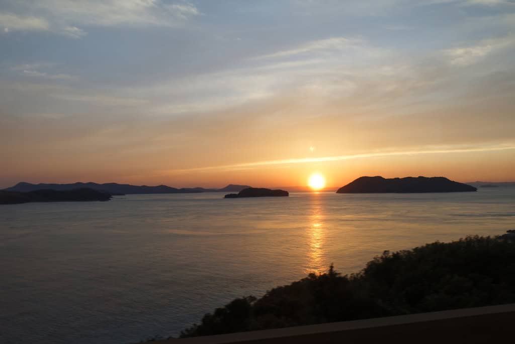 explore Japan by train Seto Ohashi Bridge sunset
