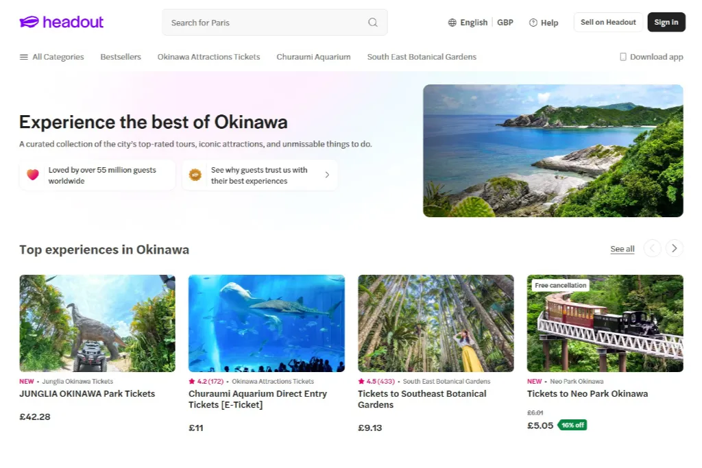 Screenshot of Headout's Okinawa experiences page, highlighting tropical island attractions such as JUNGLIA Okinawa theme park tickets, Churaumi Aquarium direct entry, Southeast Botanical Gardens, and Neo Park train rides.